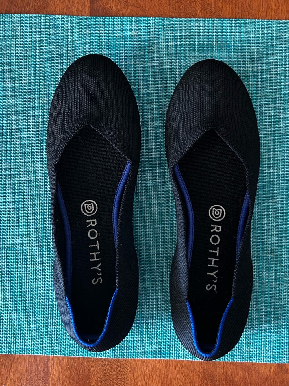 Rothy's Black Knit Flats with Blue Trim